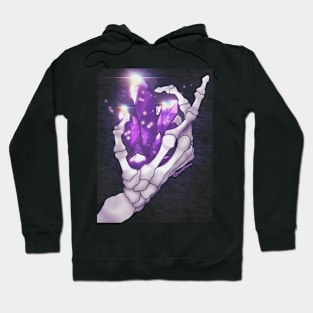 Glowing Purple crystal in a skeletons hand Hoodie